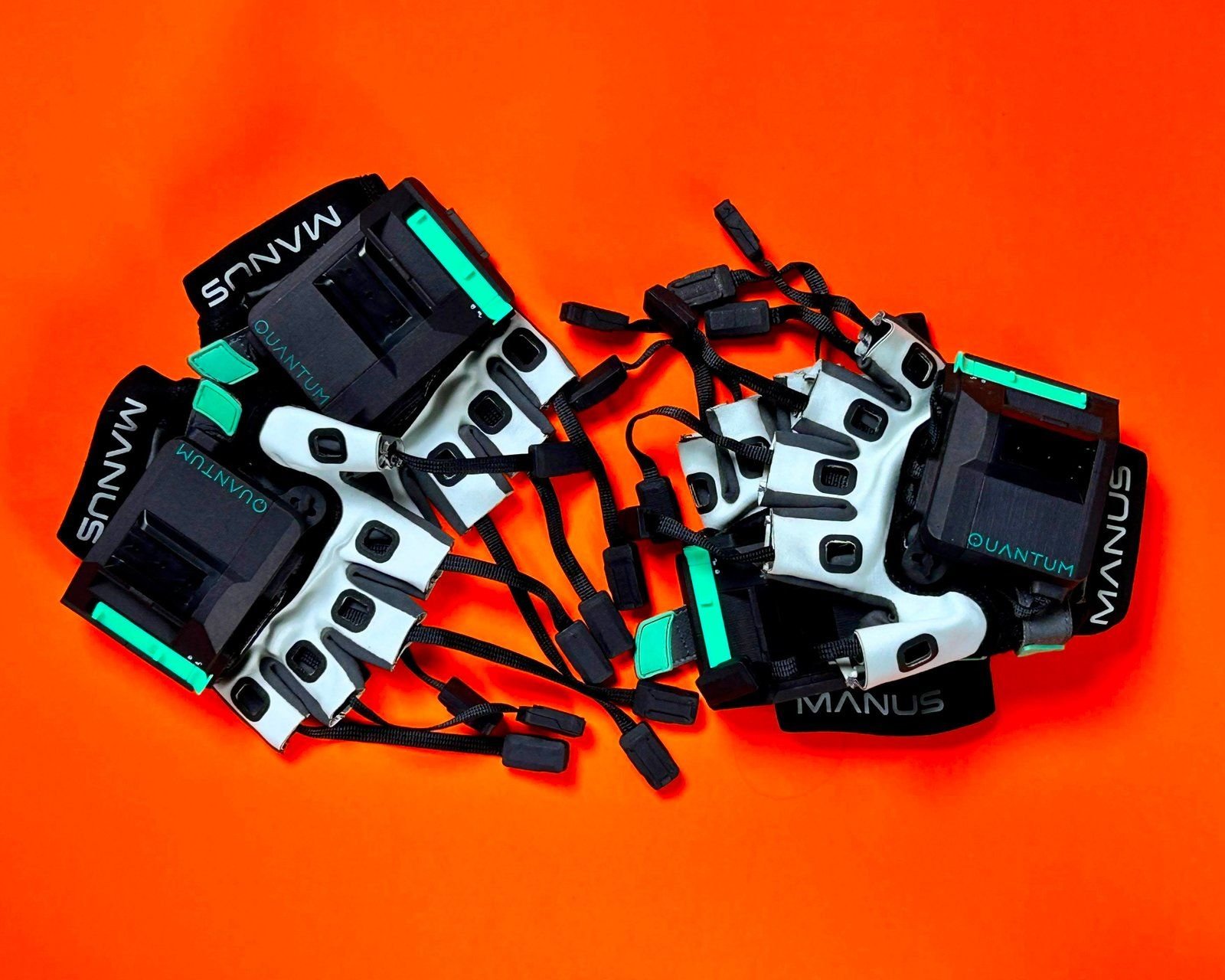 Manus motion capture gloves on an orange background